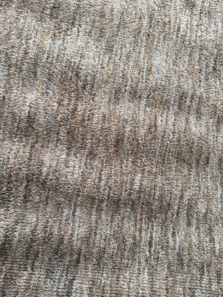 New unused Taupe rug