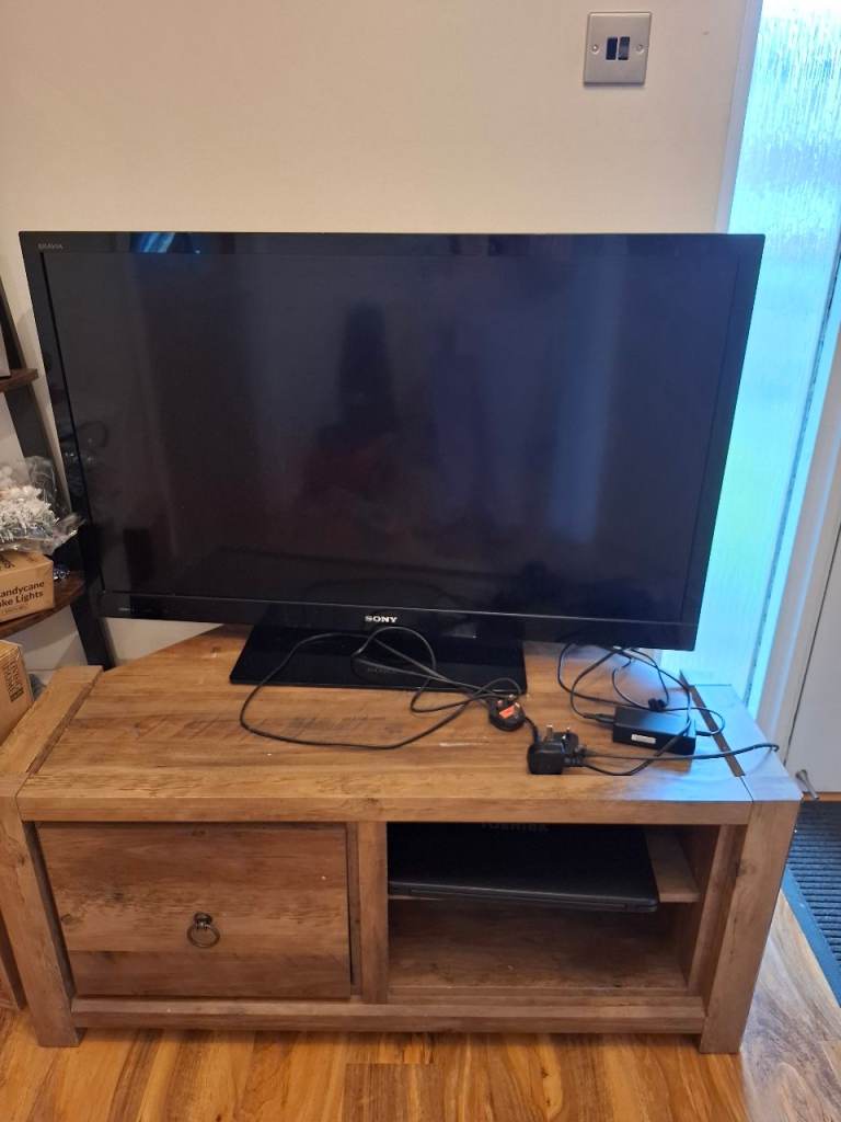 image for Sony bravo television with cabinet