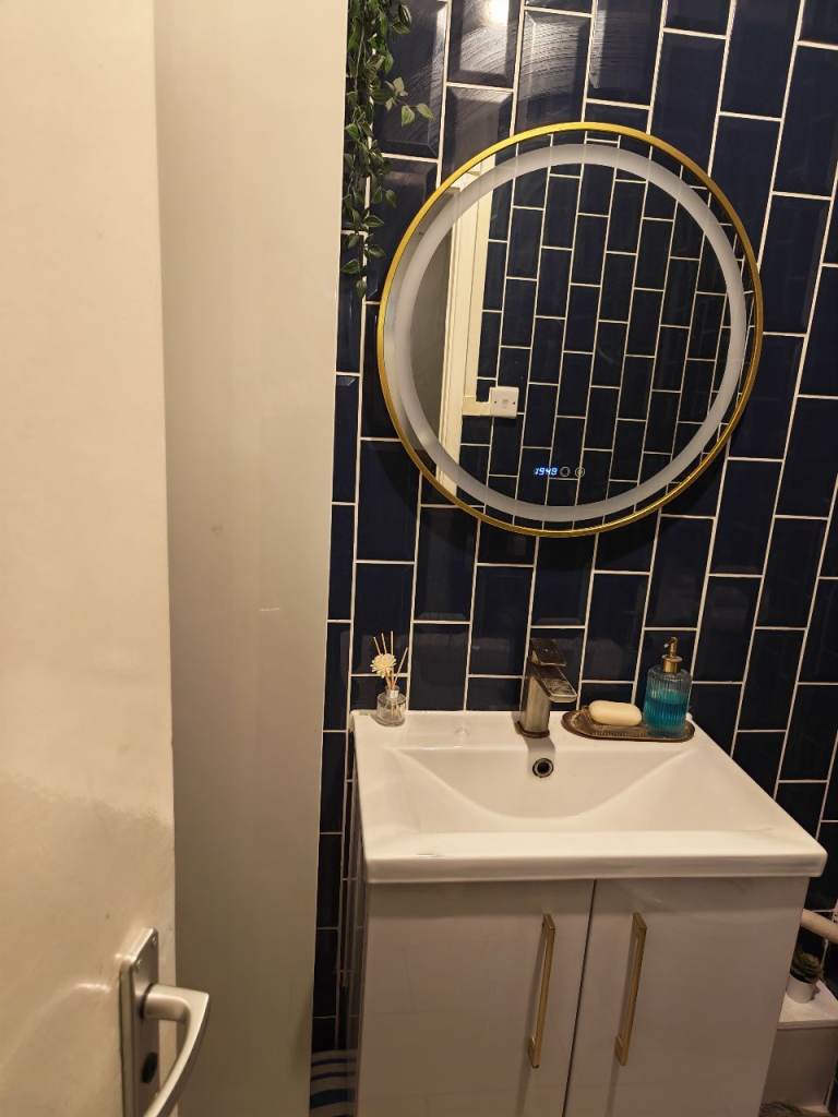 Led bathroom mirror with tim
