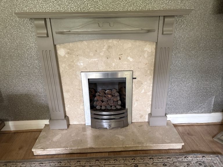 Wood fire surround 1400 w x 1200 h 