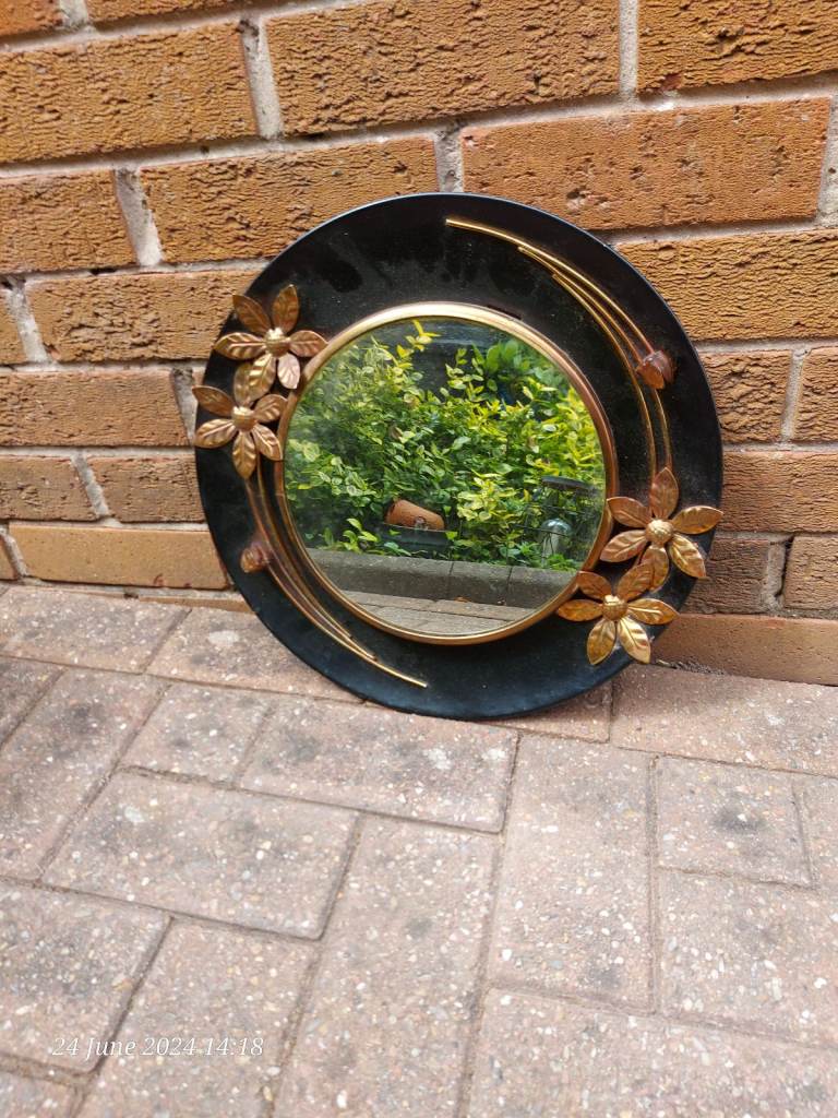 Vintage black and gold mirror