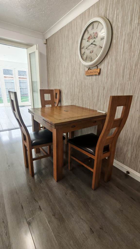 Used Oak Furniture solid oak dining table and 4 chairs