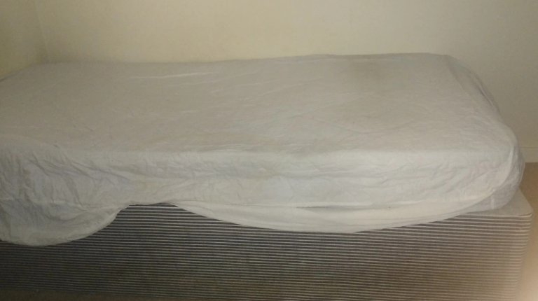 Adult size large single bed in good condition with spring mattress
