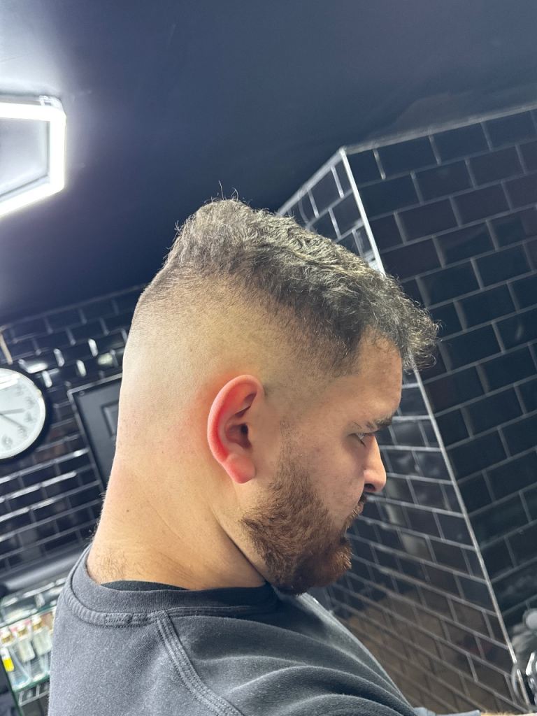 free haircuts by trainee barber