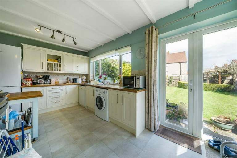 Shaker style kitchen with wooden worktops