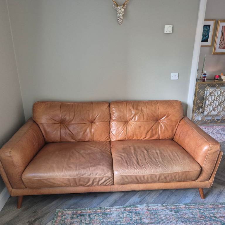 Tan leather sofa