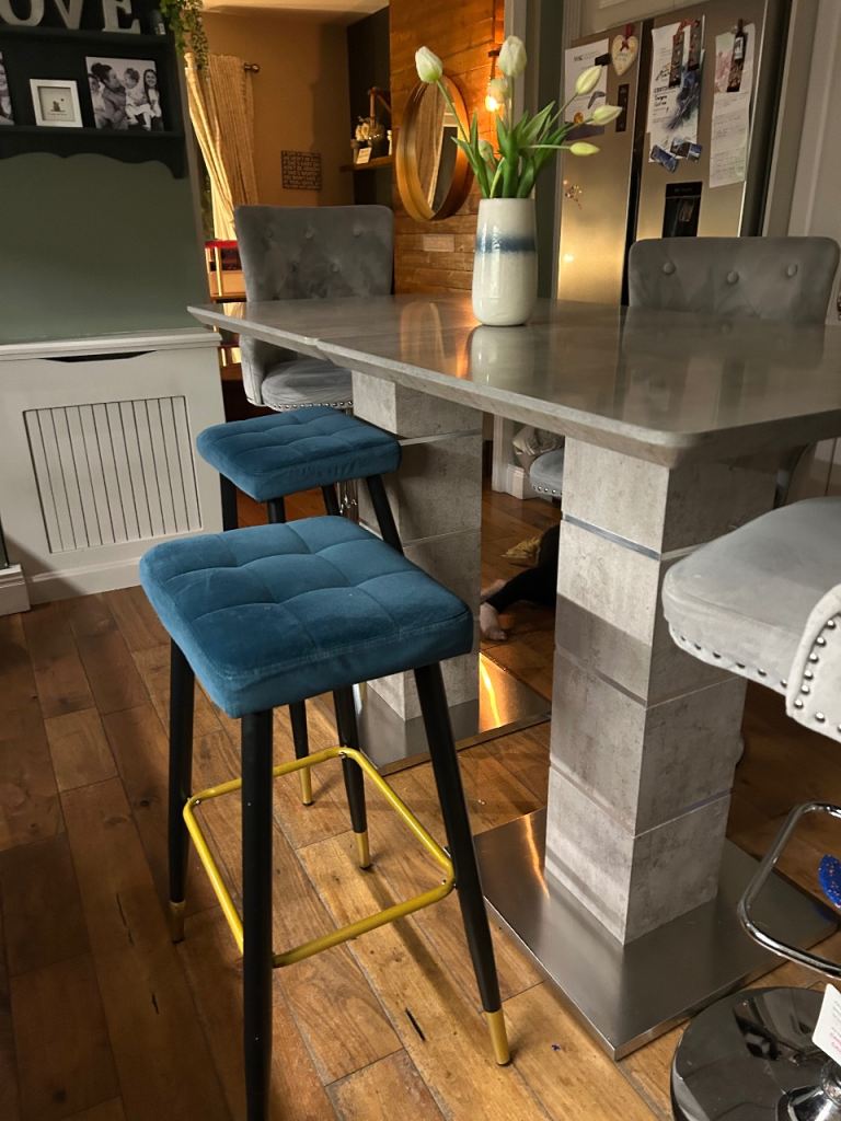 2/4 navy bar stools with black and gold legs