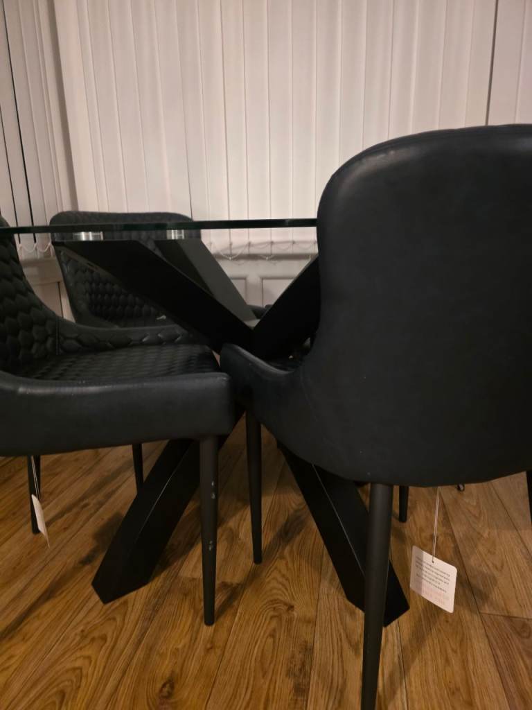 Glass table and 4 chairs