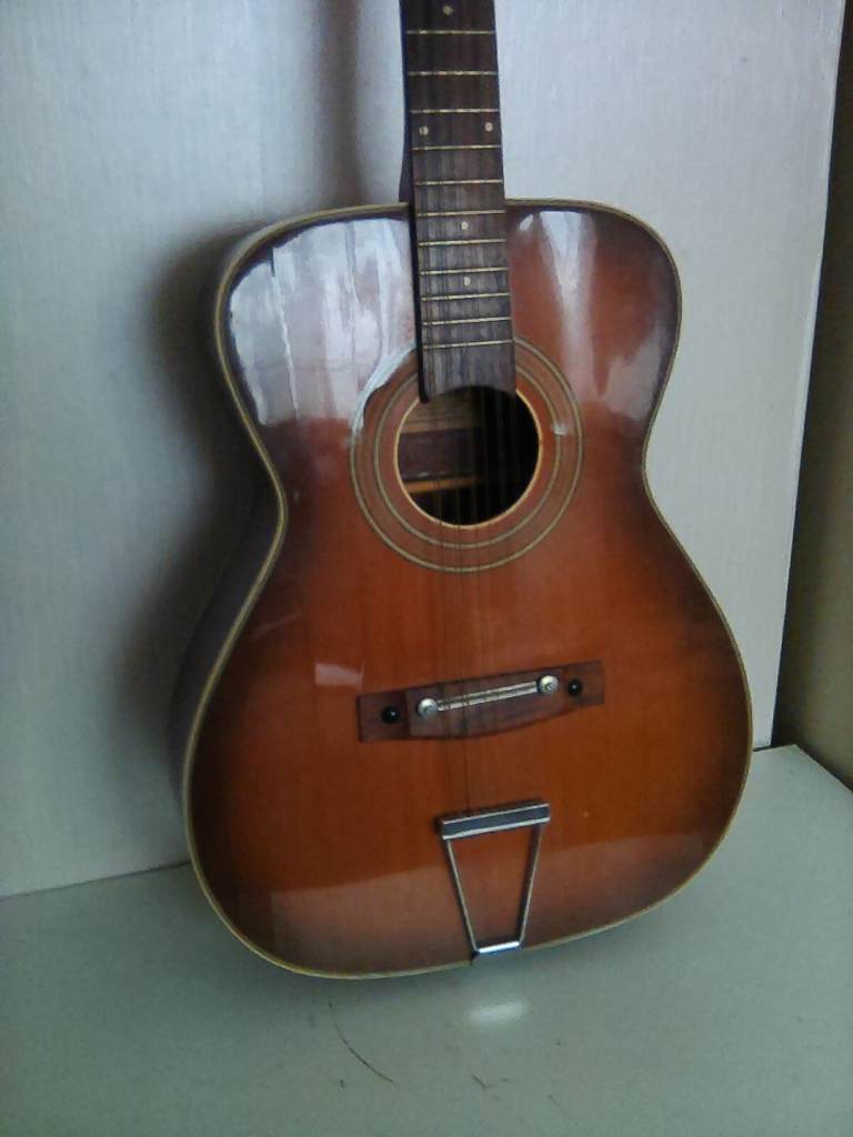 E-ROS Acoustic guitar model number 412, serial number 0850.