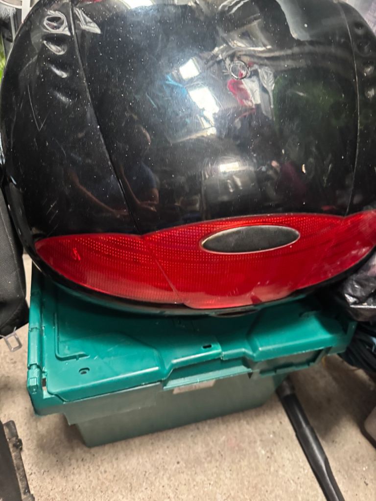 Motorbike top back box for massages  In good condition with key  