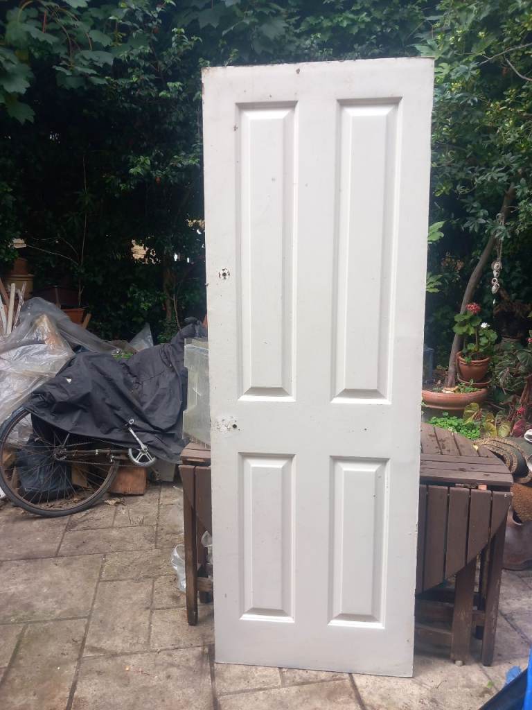 White Four-Panel Wooden Door – Ready for Use
