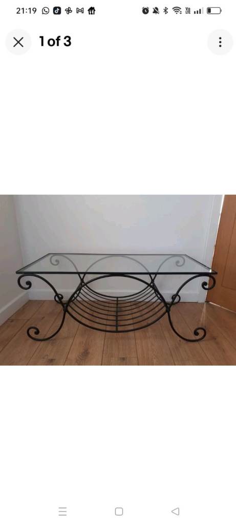 Wanted black iron coffee table glass top 