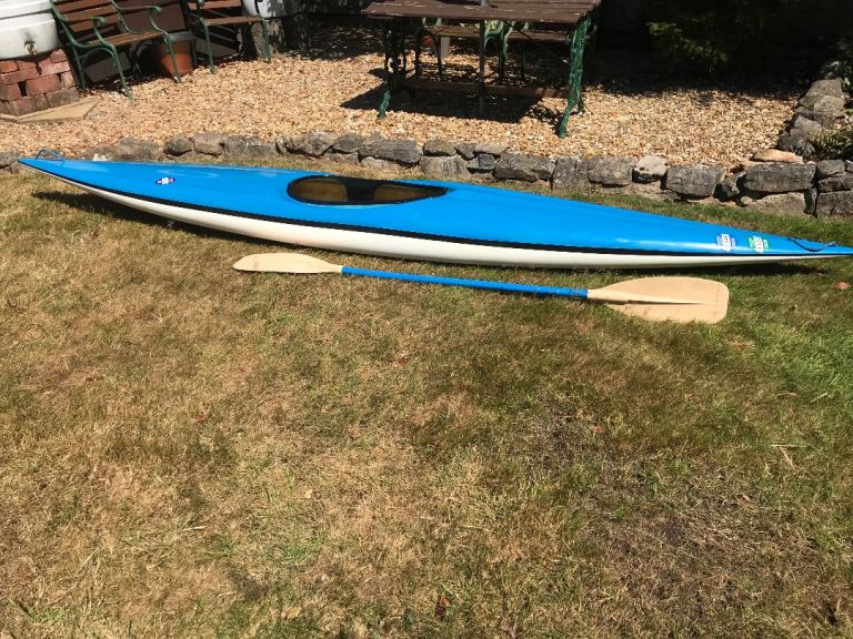 Blue / white fibreglass Kayak with Paddle – Good Condition