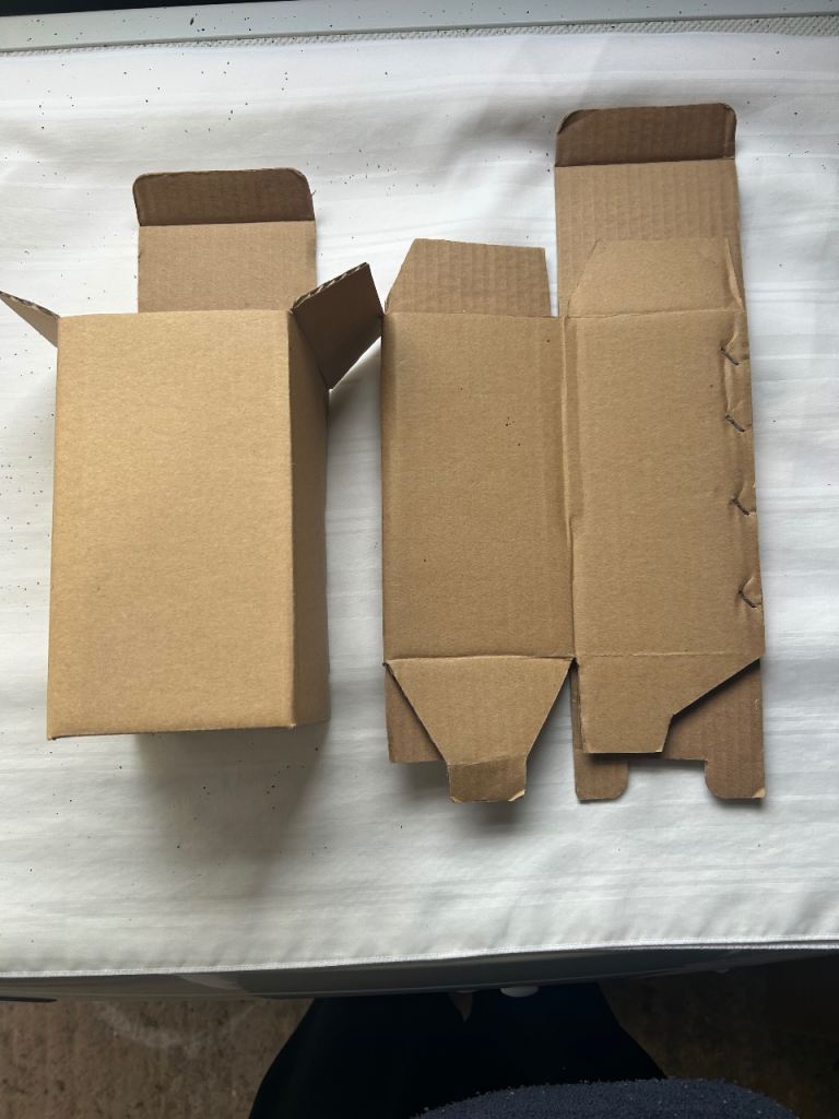 FREE 100 small cardboard packing boxes .