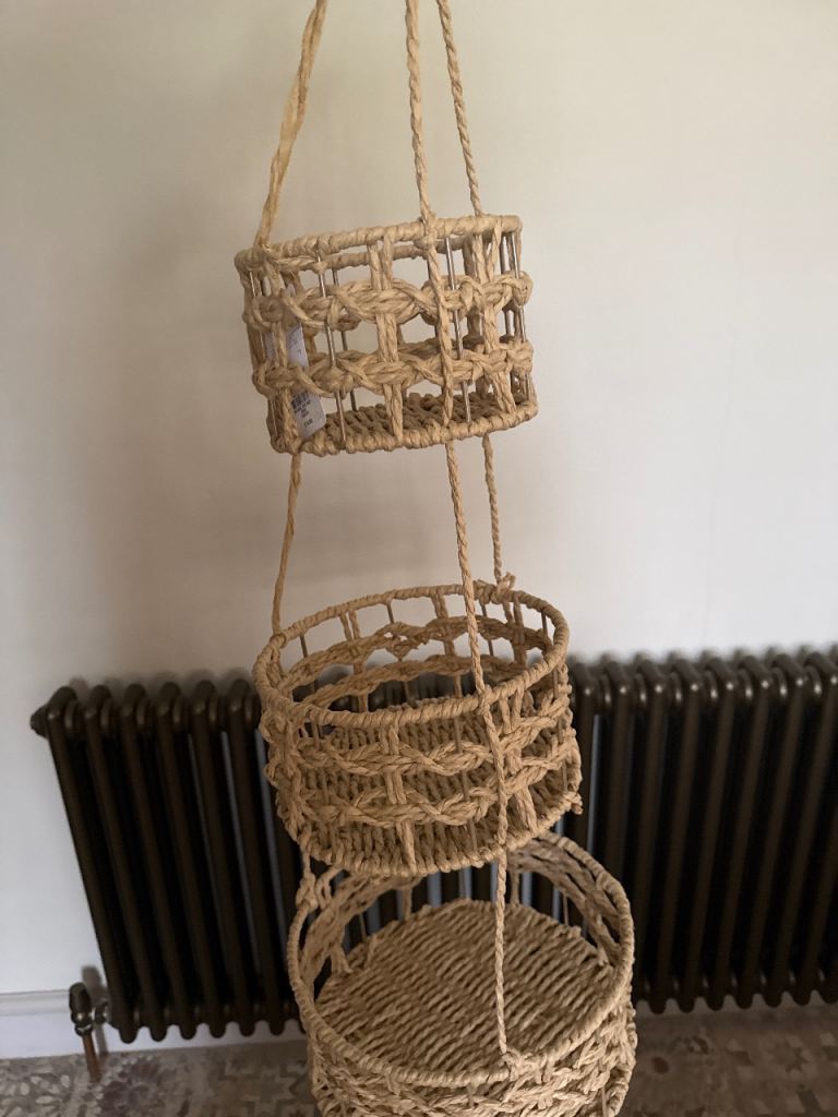 Hanging wicker storage/planter