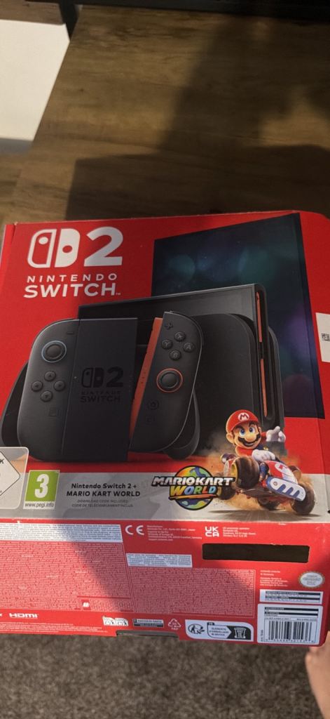 Nintendo Switch OLED with Box – Good Condition