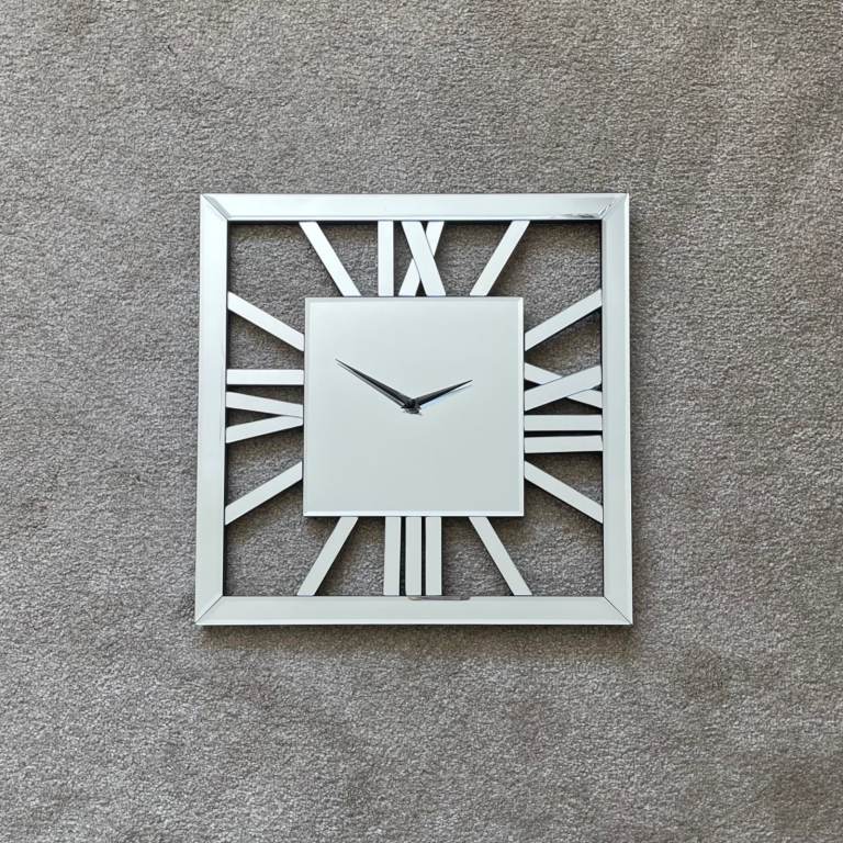 Mirrored Roman numeral wall clock