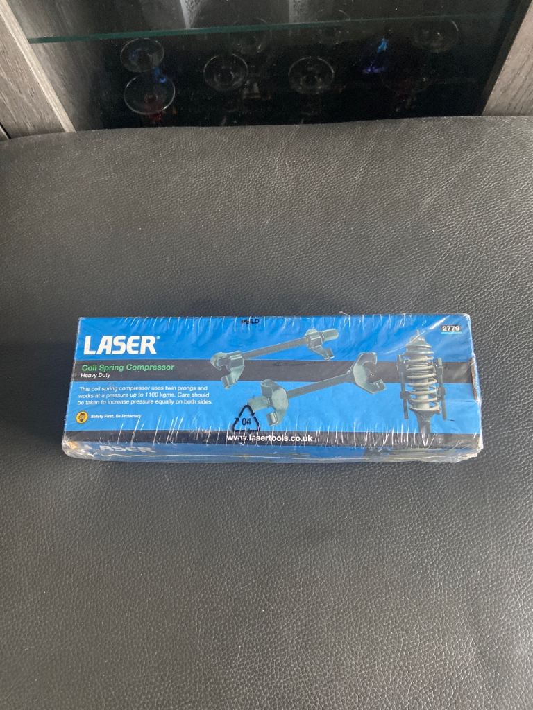 Coil spring compressor 