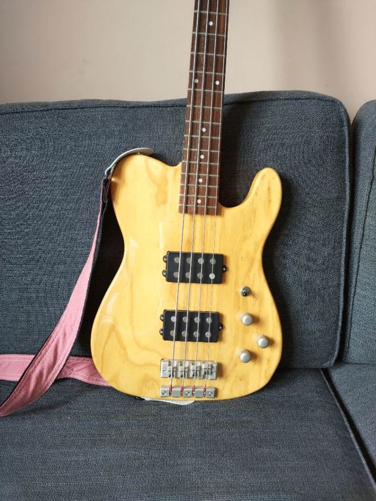 Bass guitar, by Shine.