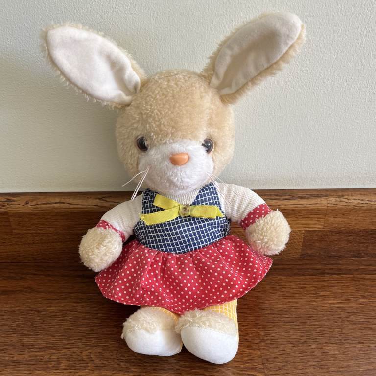 Vintage 1980's rabbit soft toy, sitting position. Attached clothing. Approx 12". CAN POST