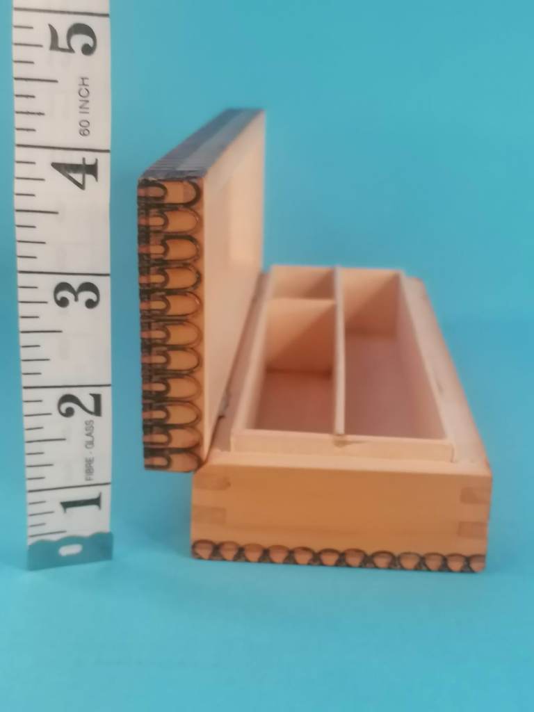 image for Vintage wooden pencil case from the 1960s, featuring pyrography decoration. 