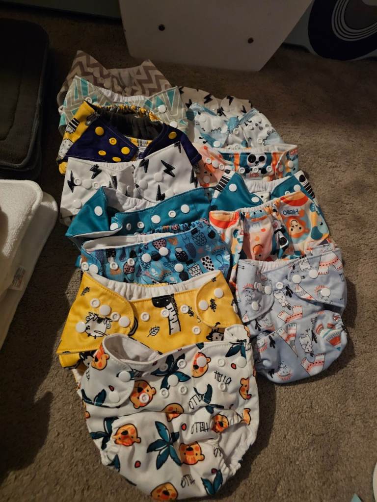 image for UNUSED reusable nappies and inserts