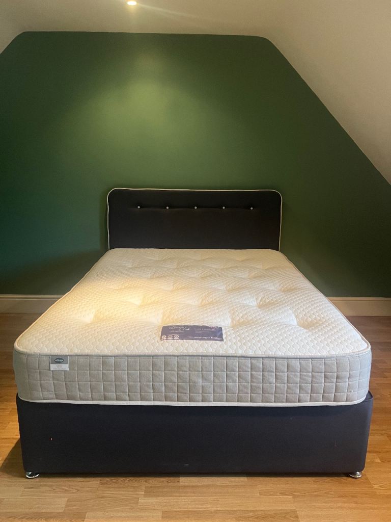 Navy double bed with head board (mattress not included)