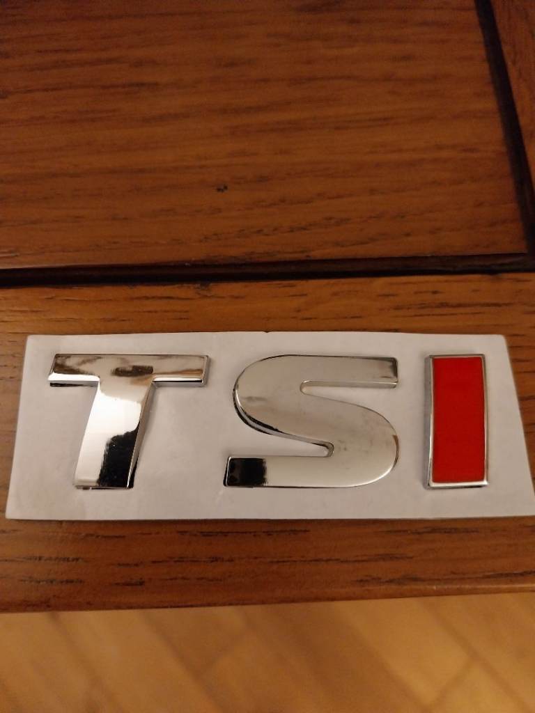 TSI adhesive car badge, brand new.