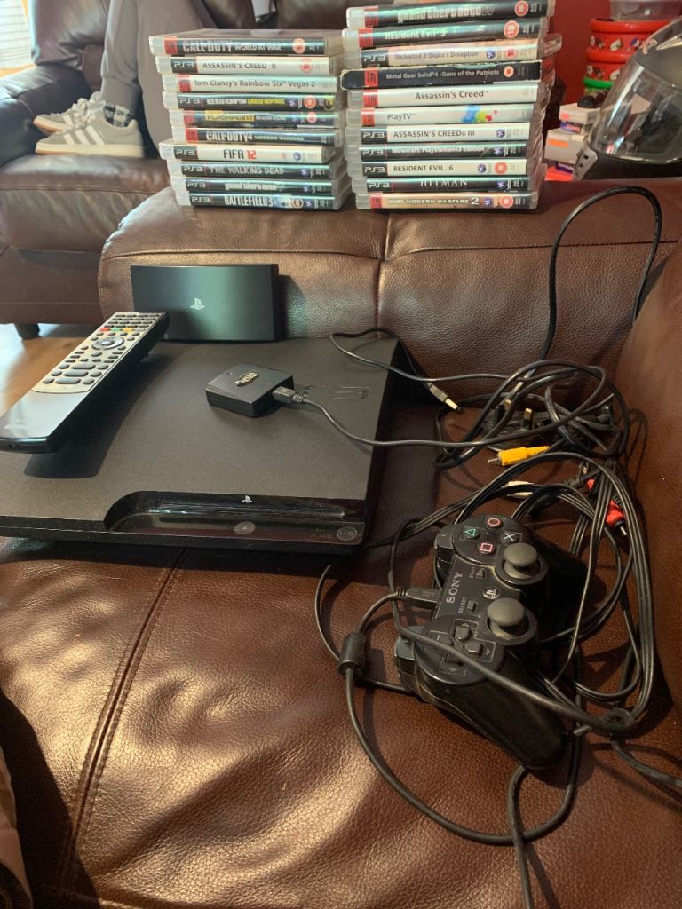 Sony PlayStation 3 Console with Games & Controller