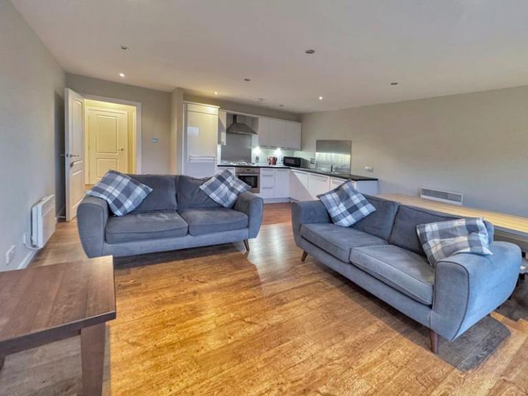 Grey Two-Seater Sofa – Fair Condition, Fabric
