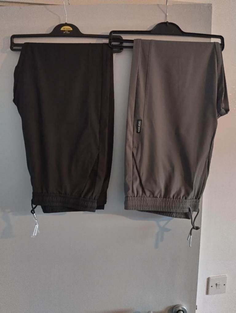 image for 2 pair of brand new men trousers both sized 38w 31 leg