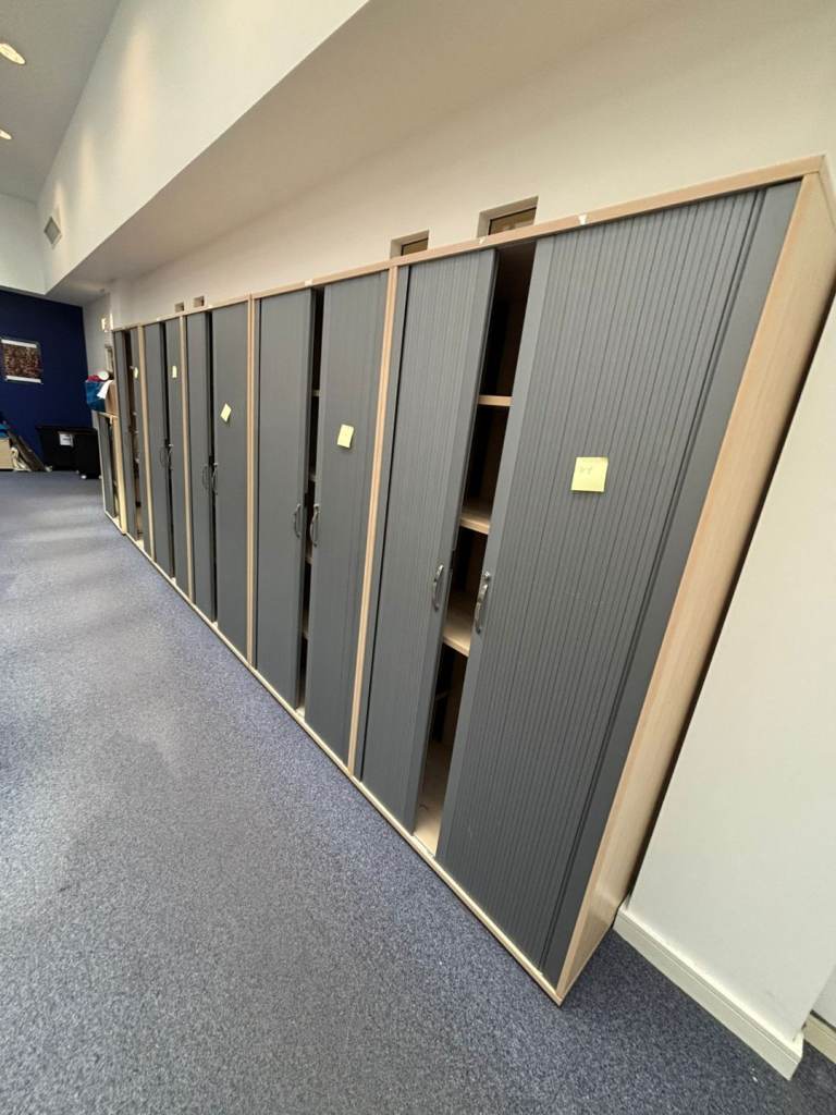 Large Sliding door tambour cupboard and filing cabinet .