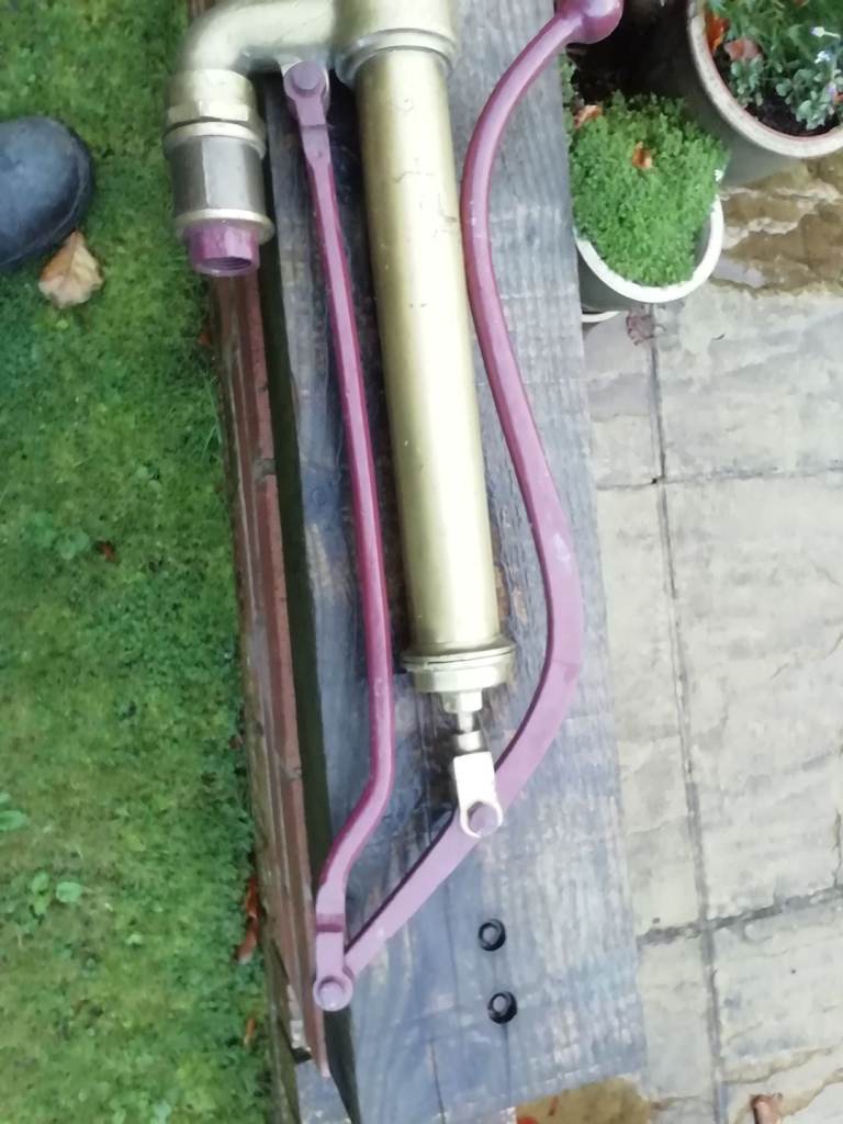 Old brass water pump