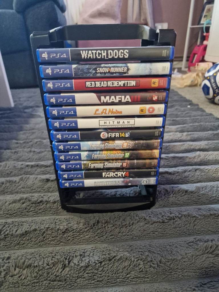 Various PS4 Games with Storage Tower OPEN TO OFFERS