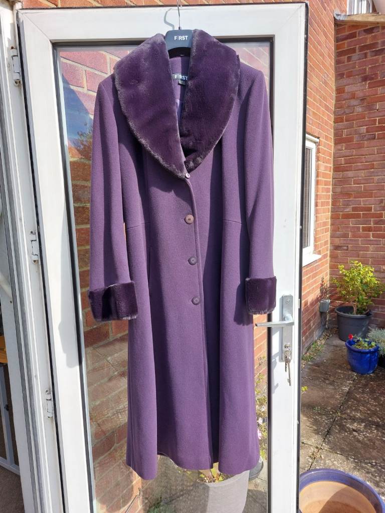 Two smart ladies' long coats. Both drastically reduced.