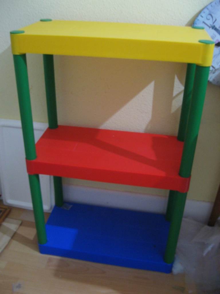 red blue yellow 3 tier childrens shelves storage £10  BH5