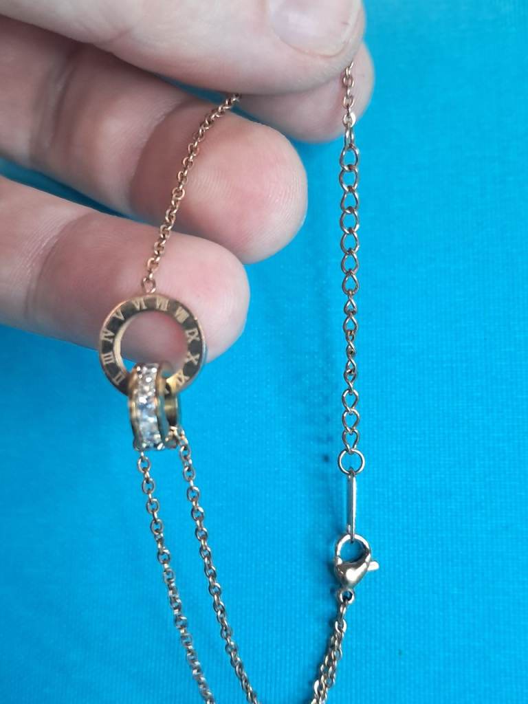 Gold Coloured bracelet with Roman Numeral Charm