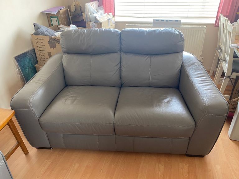 Two-Seater Grey Leather Sofa – Good Condition