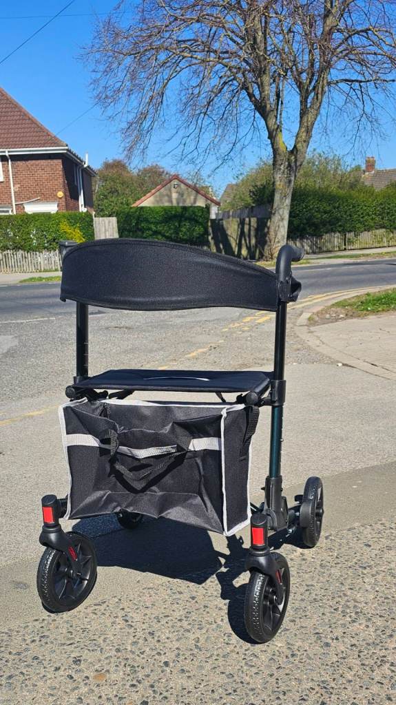 4 wheeled fold flat rollator with seat - brand new 