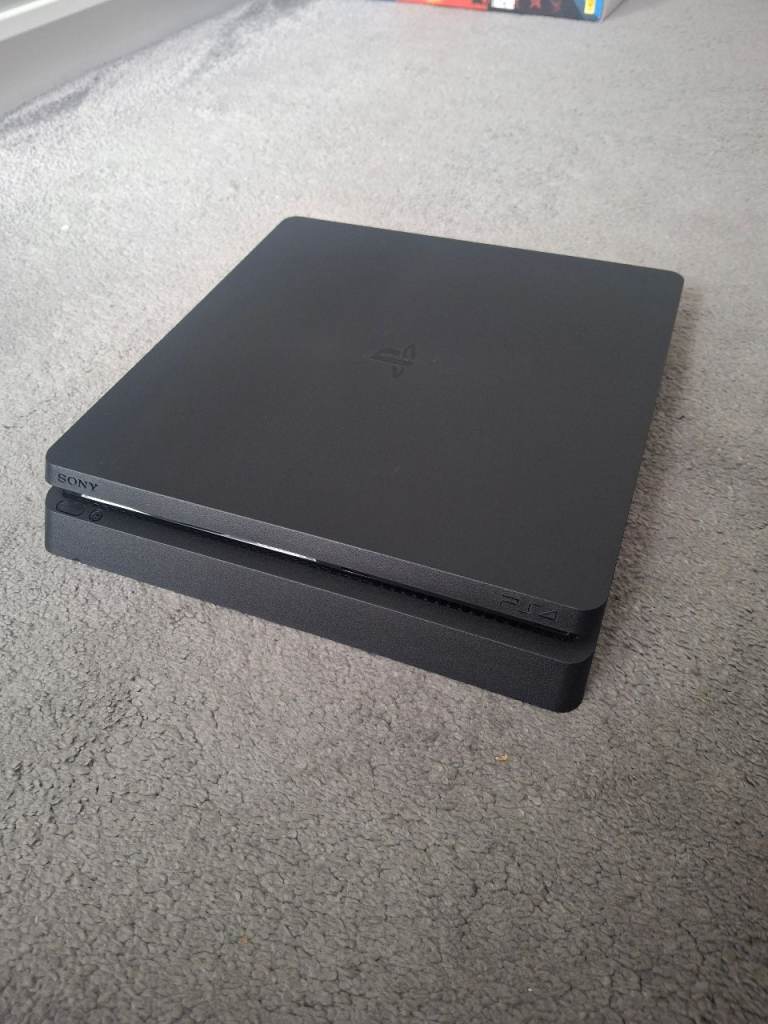 Sony PlayStation 4 Slim 500GB Console with 2 Controllers, Games and Bluetooth surround speakers.