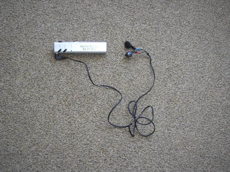 Small radio with torch & earphones.