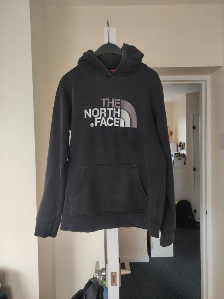 A youth North Face hooded top, big embroidered logo, good condition, size XL