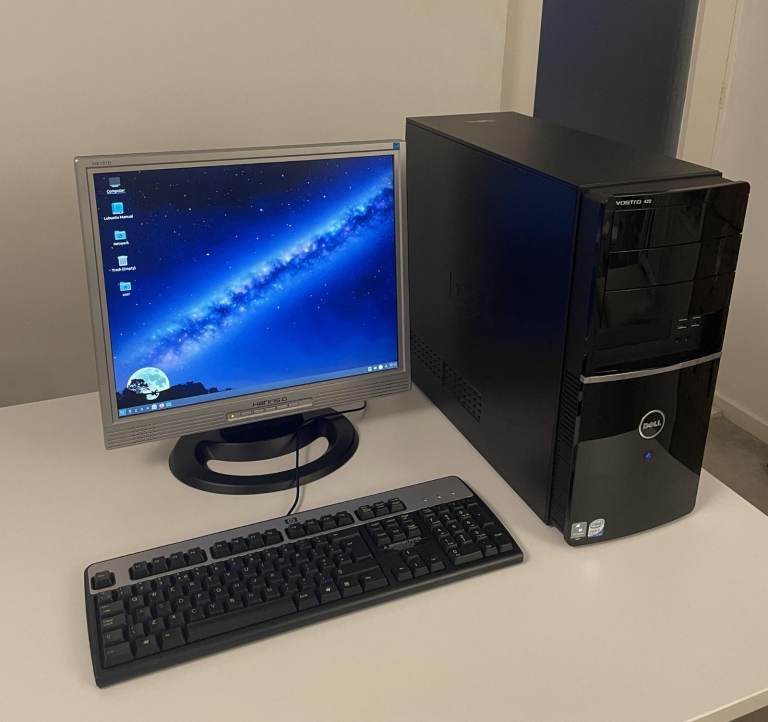 Dell Vostro 420 Core 2 Quad desktop PC, Hanns G monitor, and HP keyboard