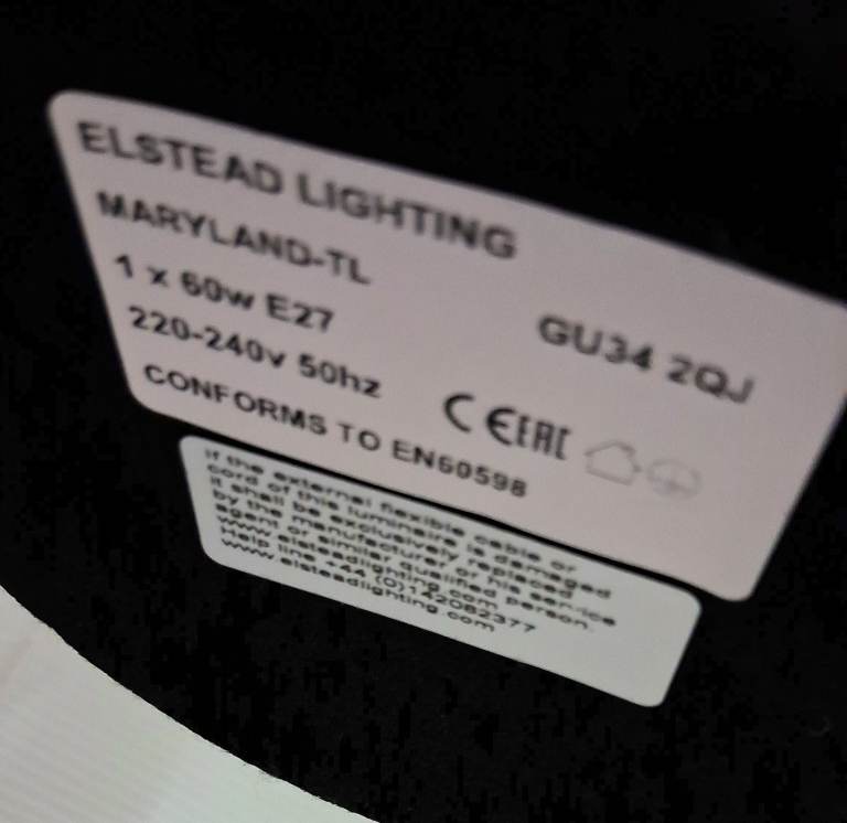 Quality lamp with white shade and 2 cream golden shades.  Almost new