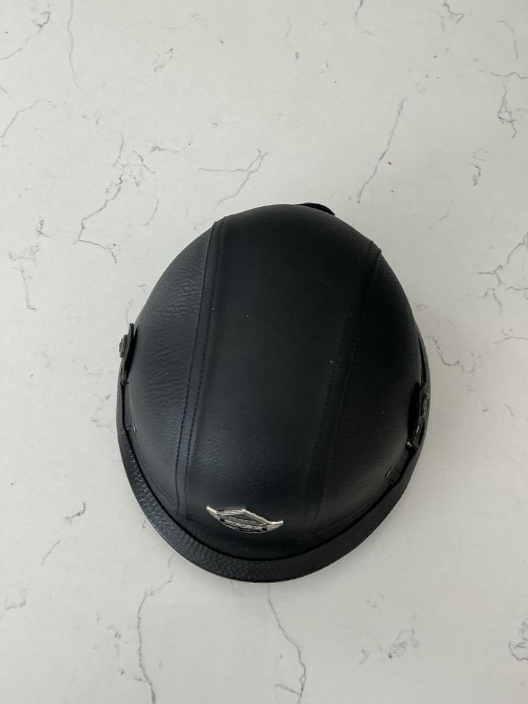 Two leather look German crash helmets