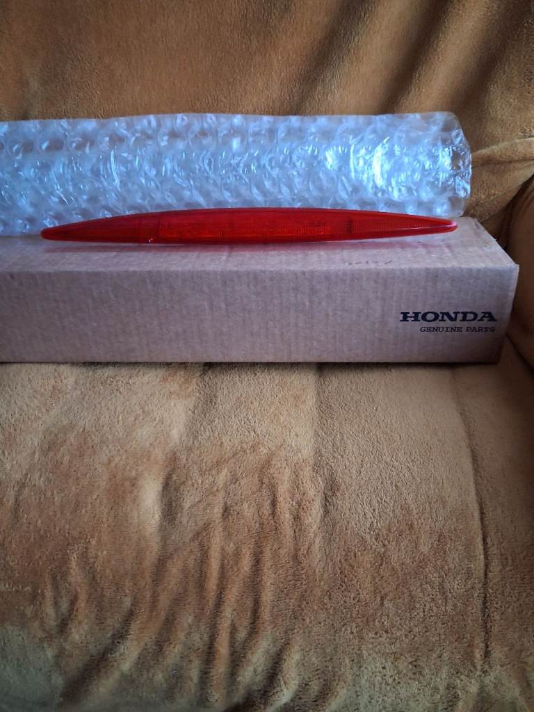 New. Still In The Box Genuine Honda CRV Red L,E.D. 3rd. Rear Stop Light.