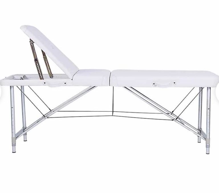 White massage table