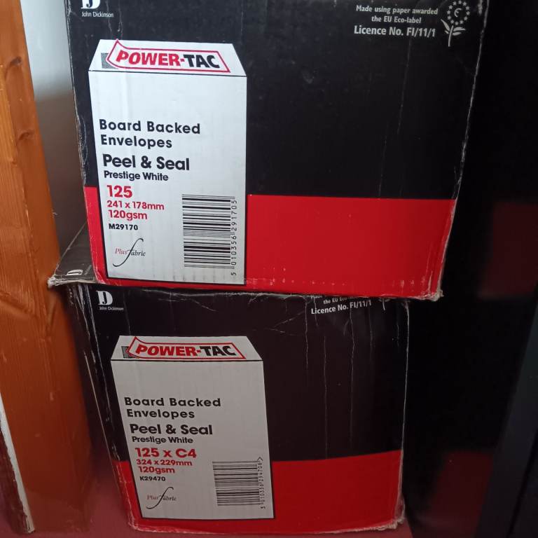 2 boxes of white hardback envelopes 