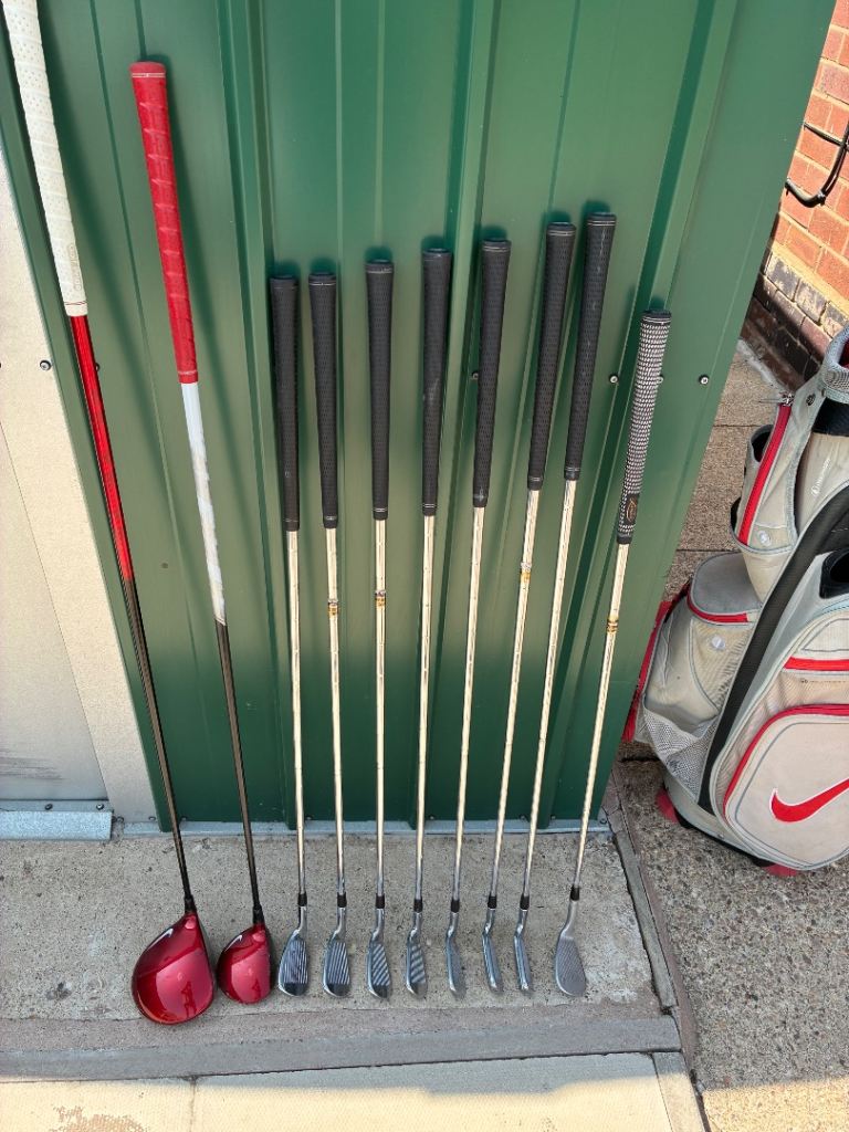 Nike Golf Bag with Driver & 3 Wood Clubs – Good Condition