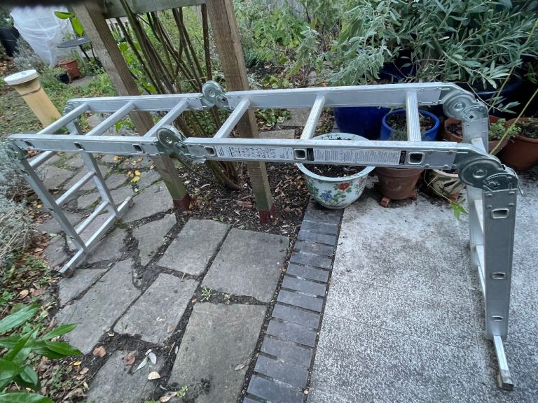 Multipurpose folding ladder